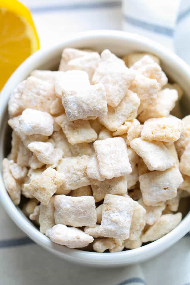 Lemon Chex Mix in a white bowl