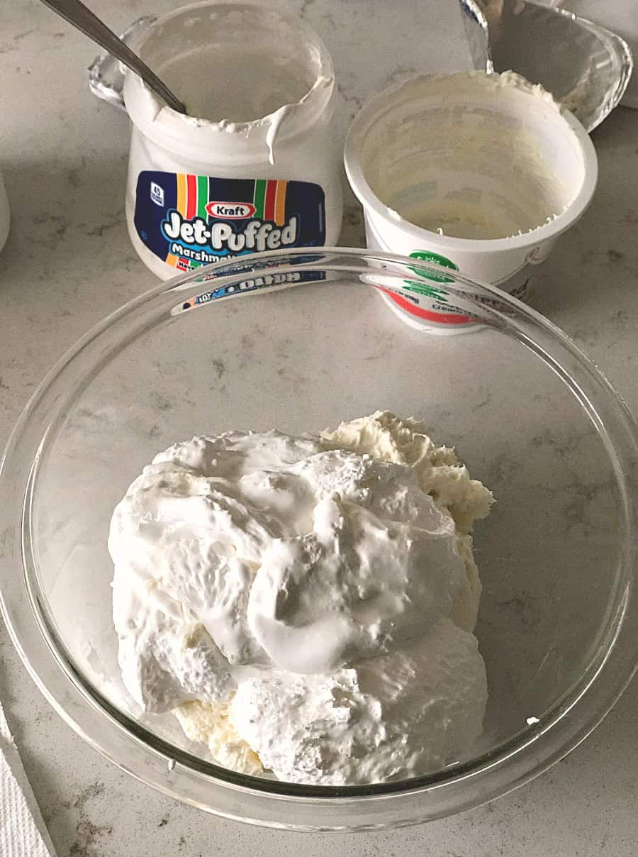 Marshmallow Creme and Whipped cream cheese in a mixing bowl