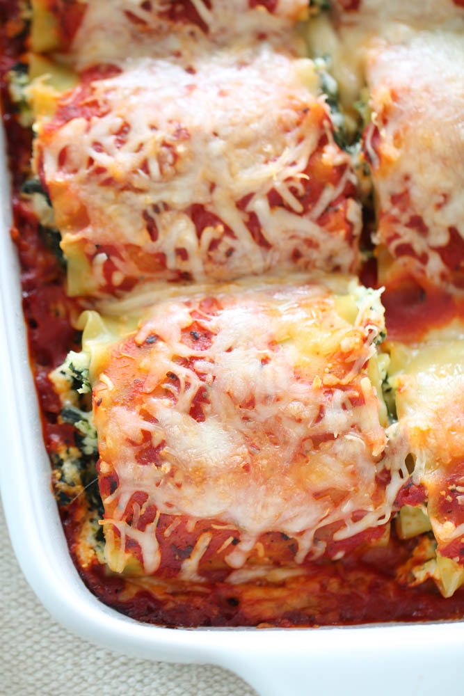 Close up of Spinach Lasagna Rolls in a pan