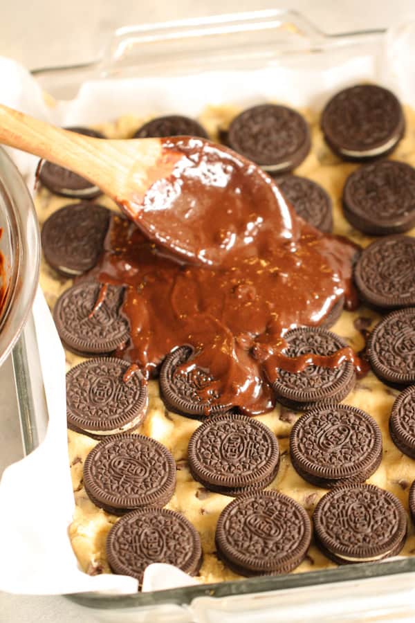 Spreading Brownie Batter on top of the Oreo cookie layer