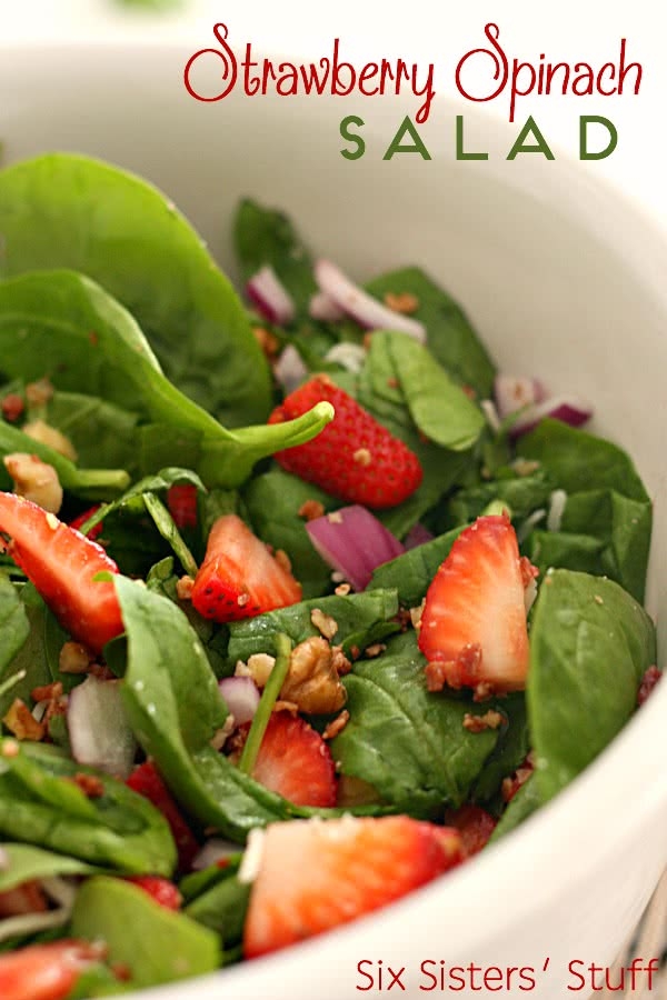 Strawberry Spinach Salad with Homemade Dressing in a white bowl
