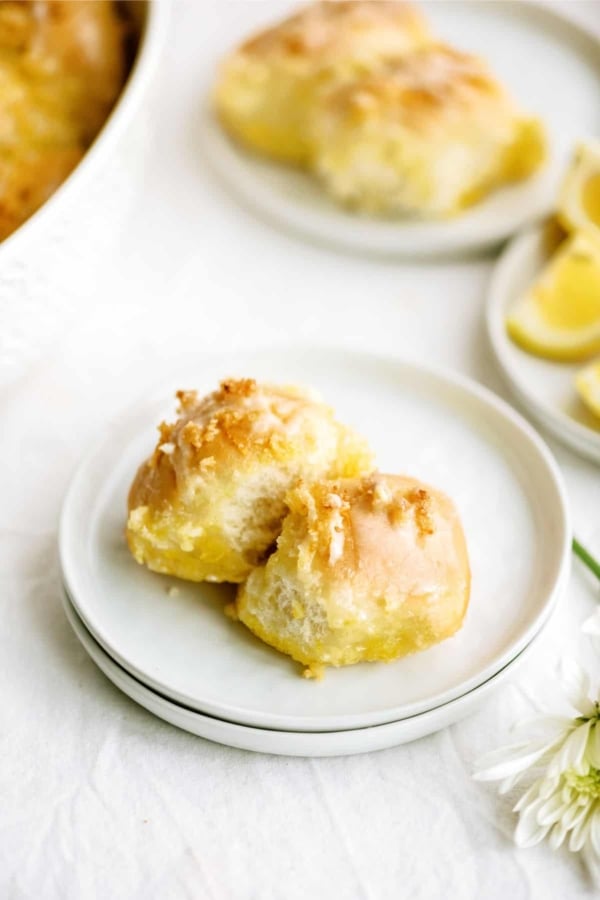 2 easy lemon pull apart rolls on a plate.