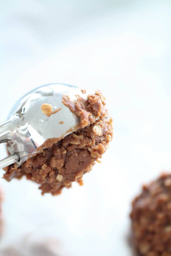 A cookie scoop full of No-Bake Cookie dough.