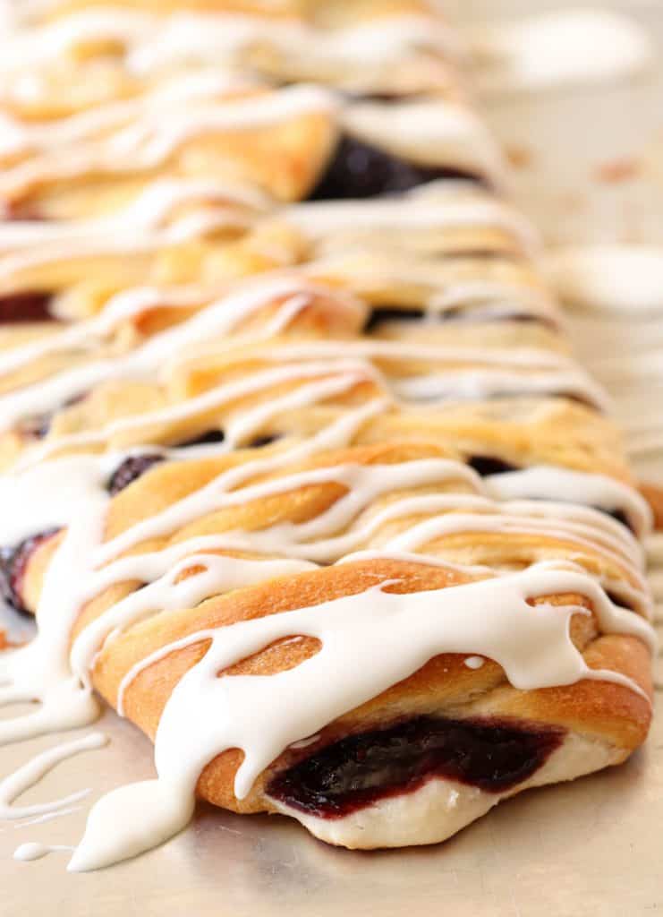 Baked Blackberry and Cream Cheese Danish with icing on top.