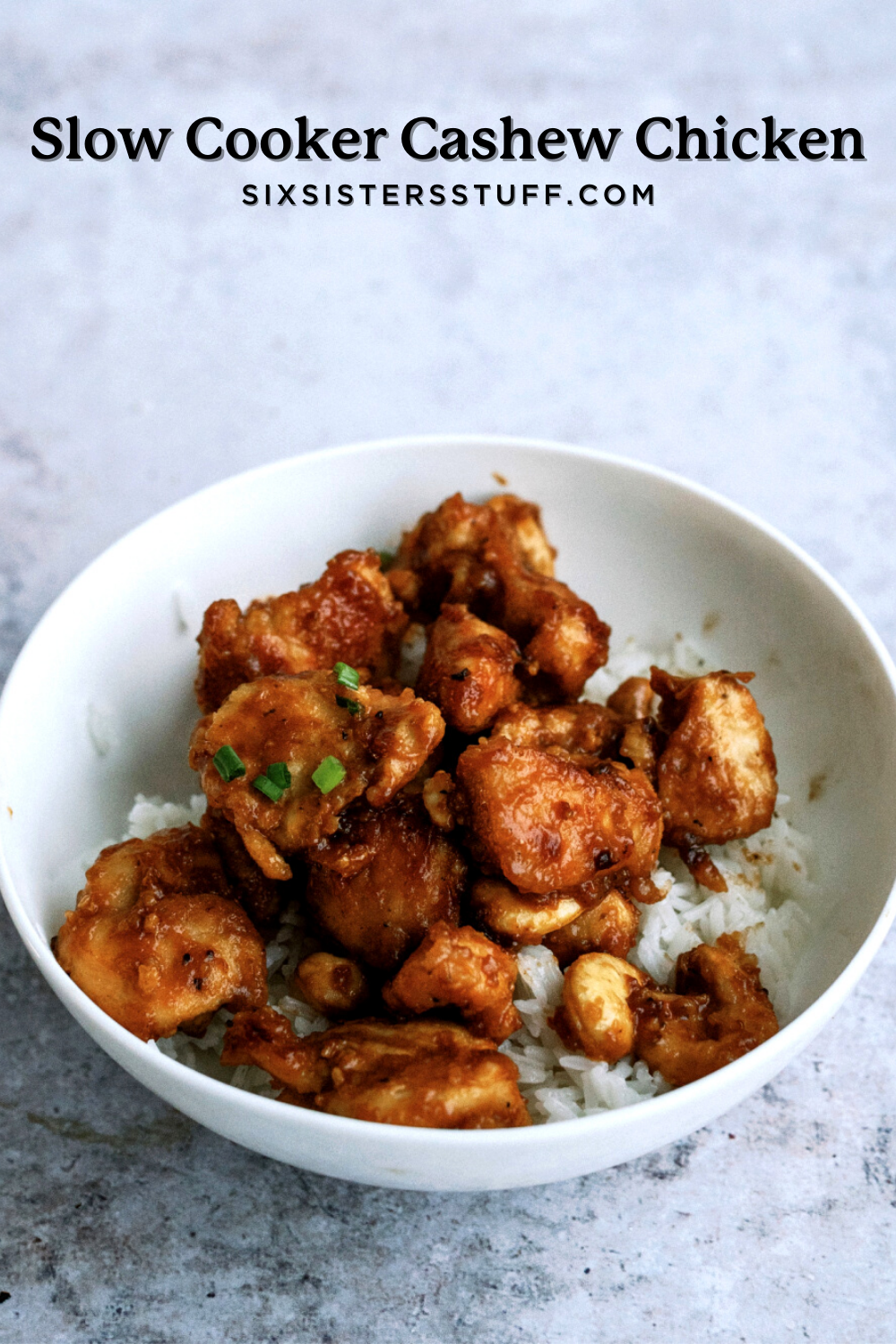 Slow Cooker Cashew Chicken in a bowl served over rice