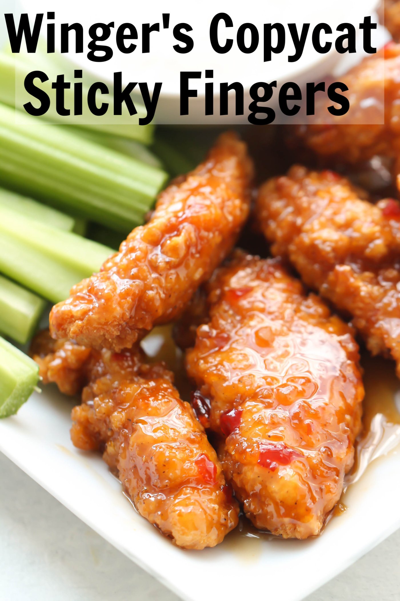 Winger’s Sticky Fingers on a plate with celery sticks