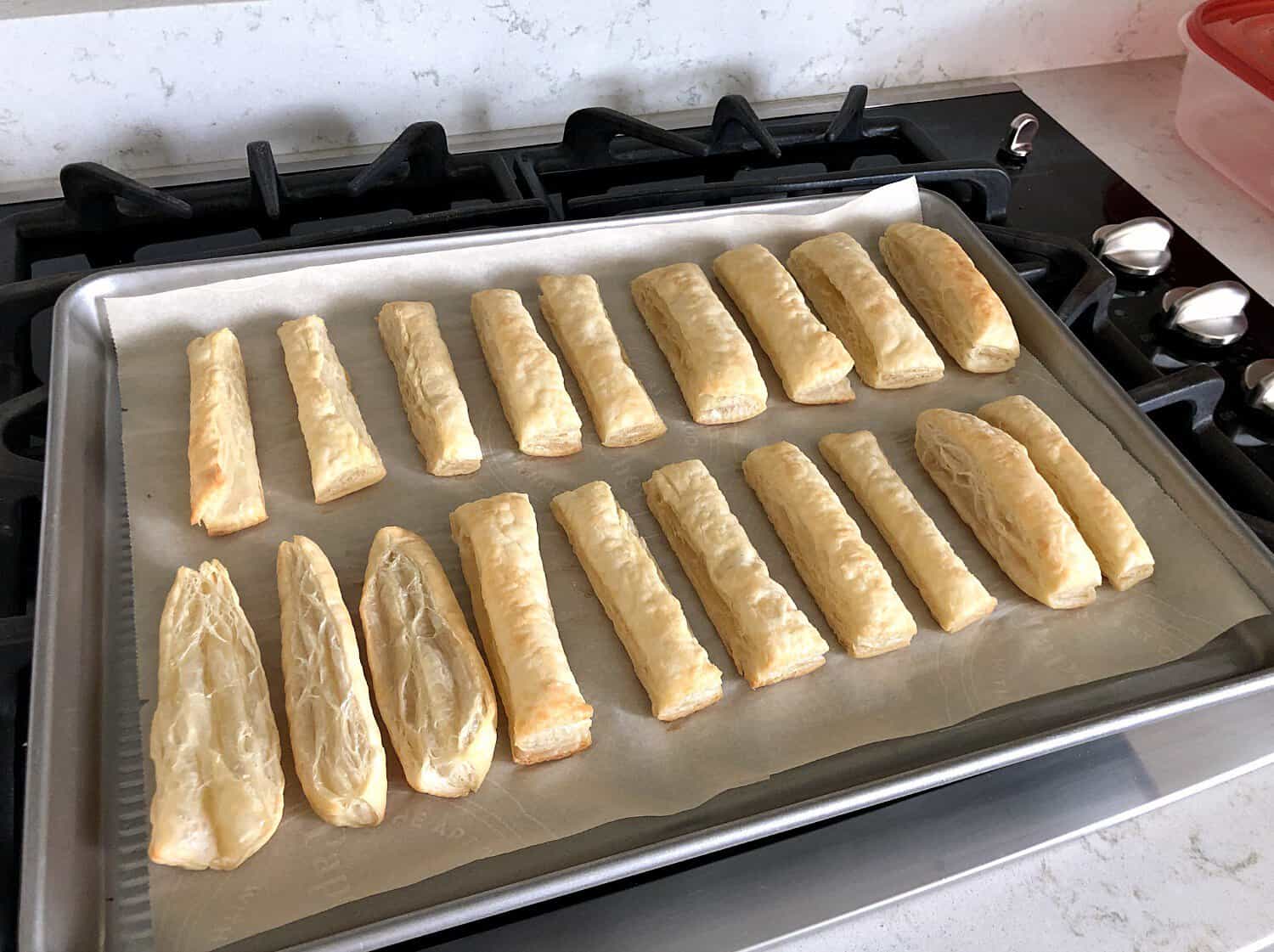 Puff pastry sliced  and cooked on a baking sheet