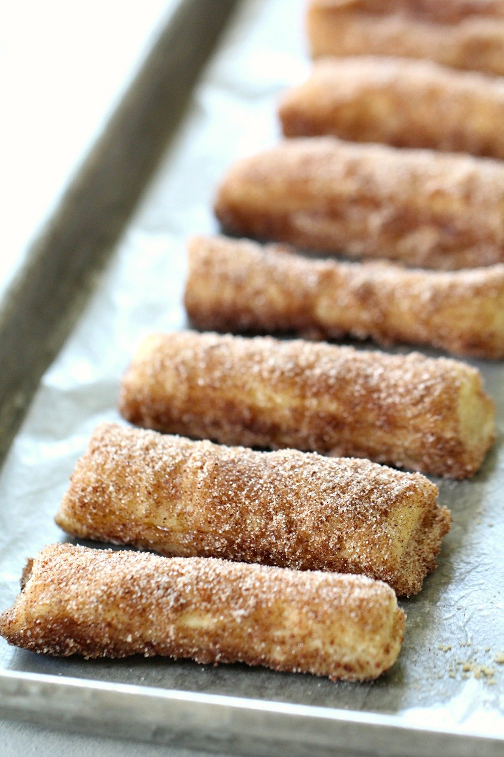 Puff Pastry Baked Churros on a baking sheet