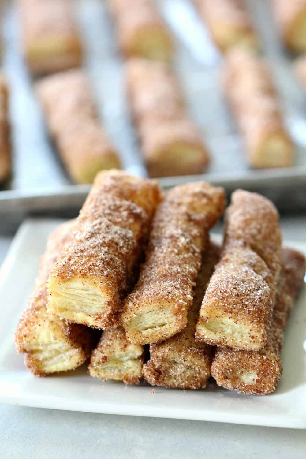 Puff Pastry Baked Churros on a serving plate