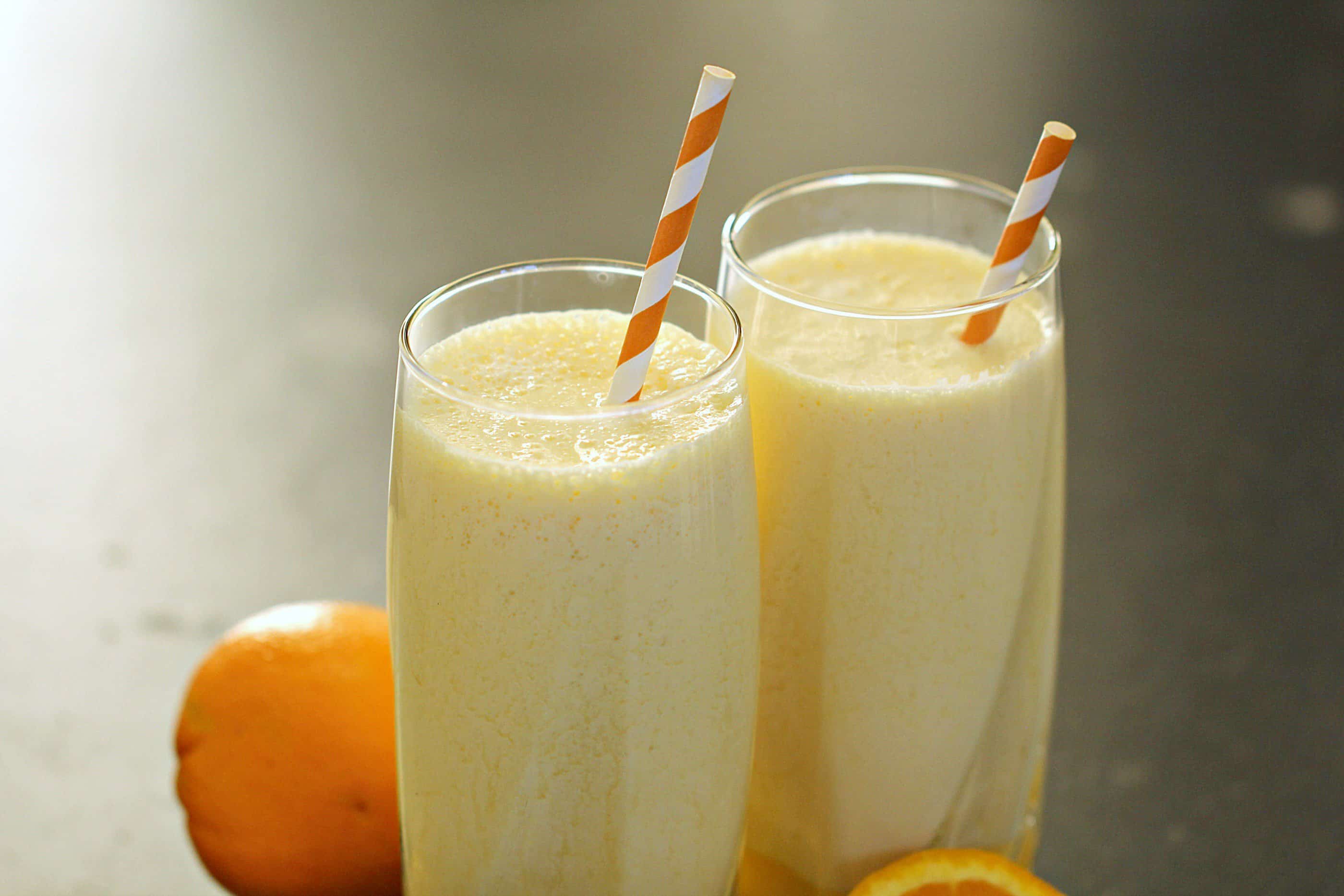 Two glasses of Orange Julius Copycat with Bananas