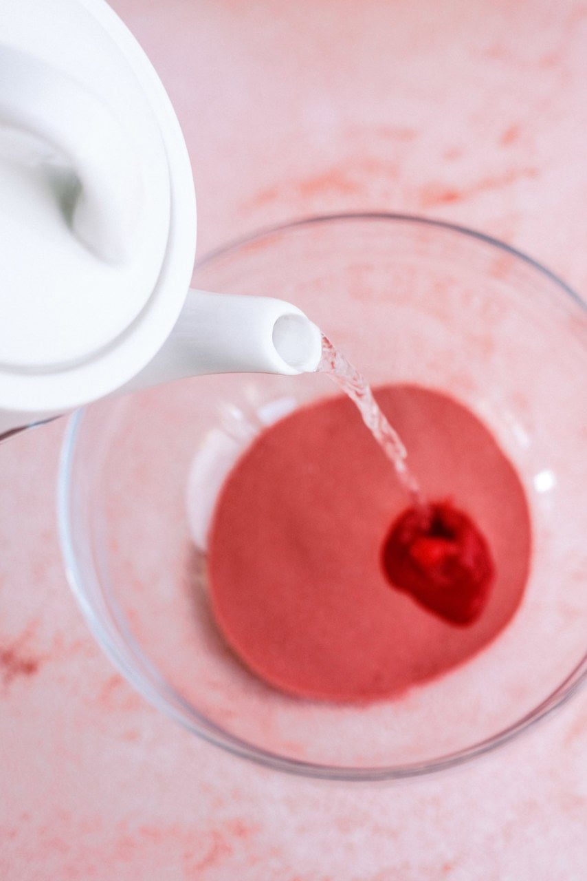 boiling water poured over raspberry jello