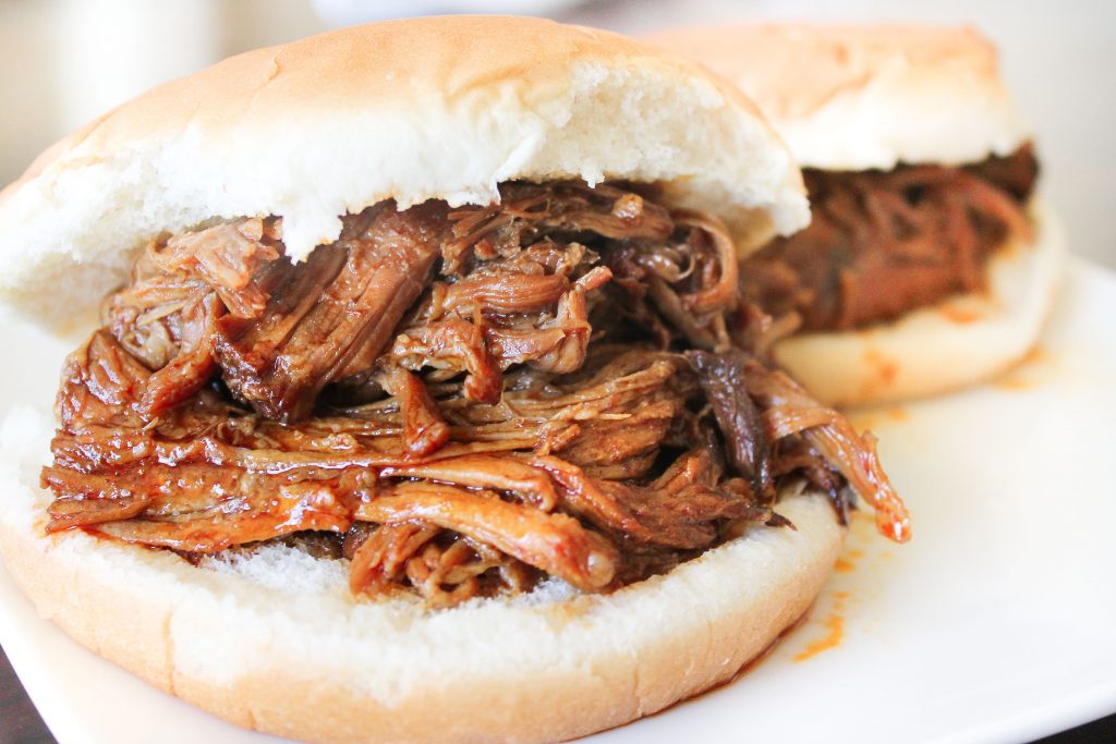 Slow Cooker Smoky BBQ Pulled Pork Sandwiches | Six Sisters' Stuff