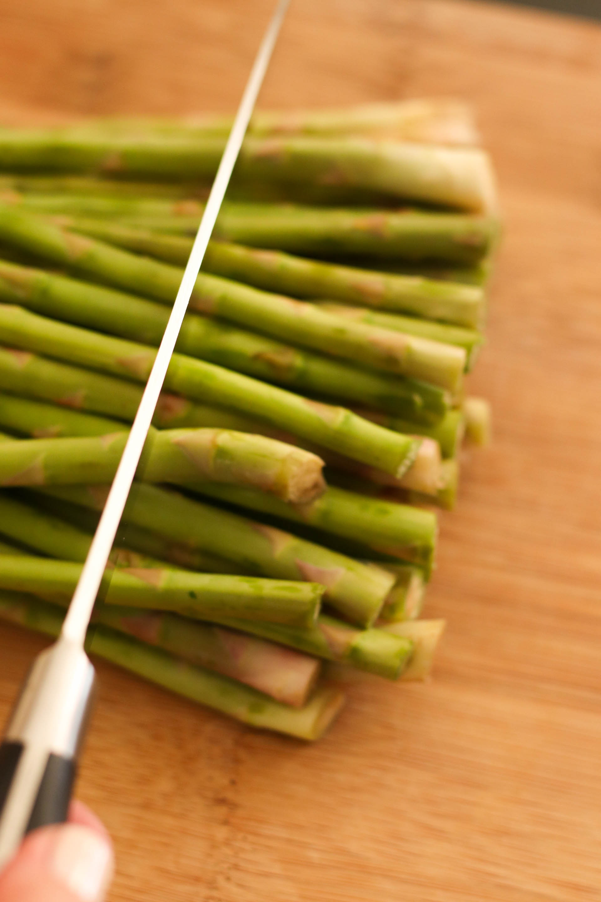 Cutting off the ends of the asparagus spears