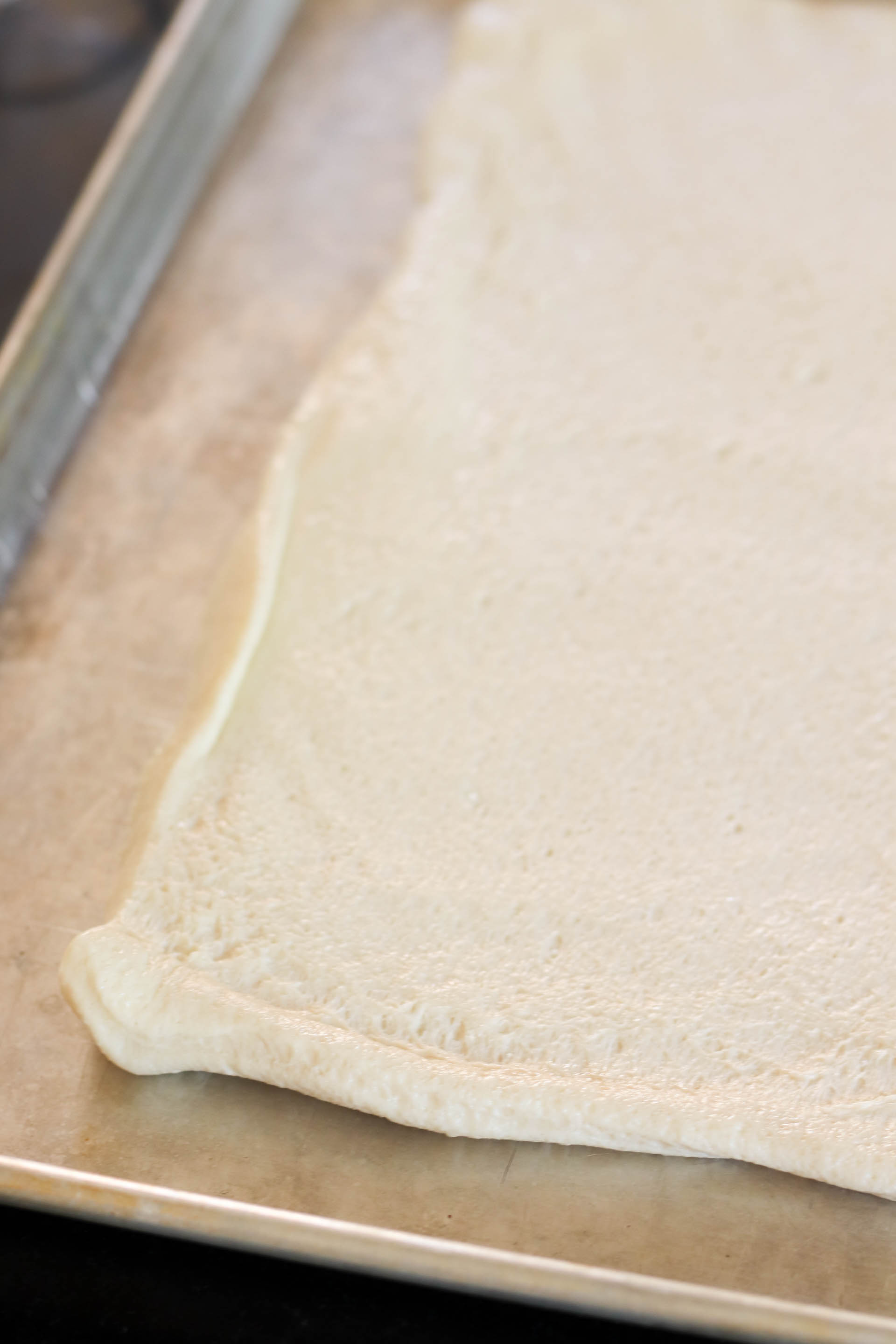 Pizza dough on sheet pan