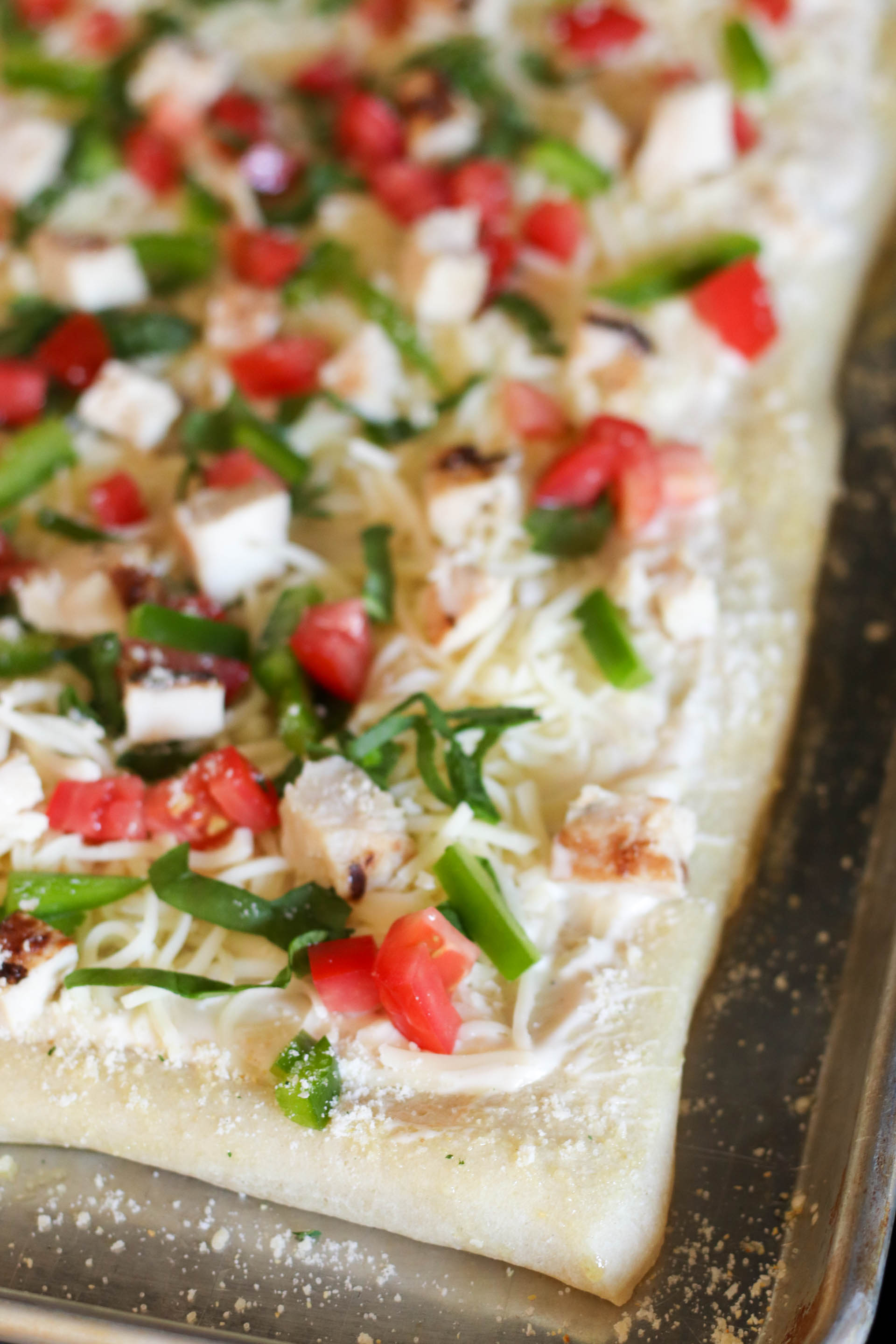 Alfredo Grilled Chicken Pizza baked on a sheet pan