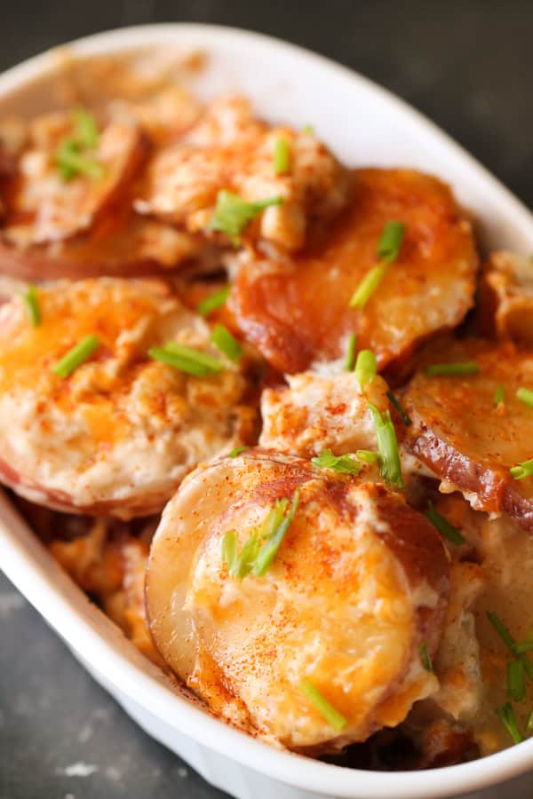 Slow Cooker Scalloped Potatoes in a serving dish
