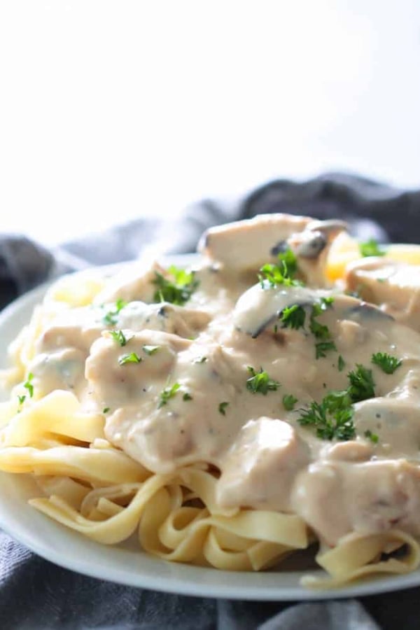 chicken Alfredo made healthier with less fat served with fettecine