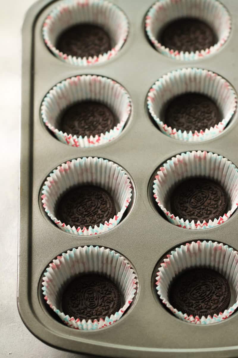 Oreo cookie in bottom of cupcake liner