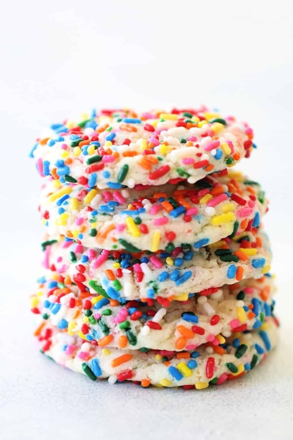 5 freshly baked Funfetti Cake Mix Cookies stacked.