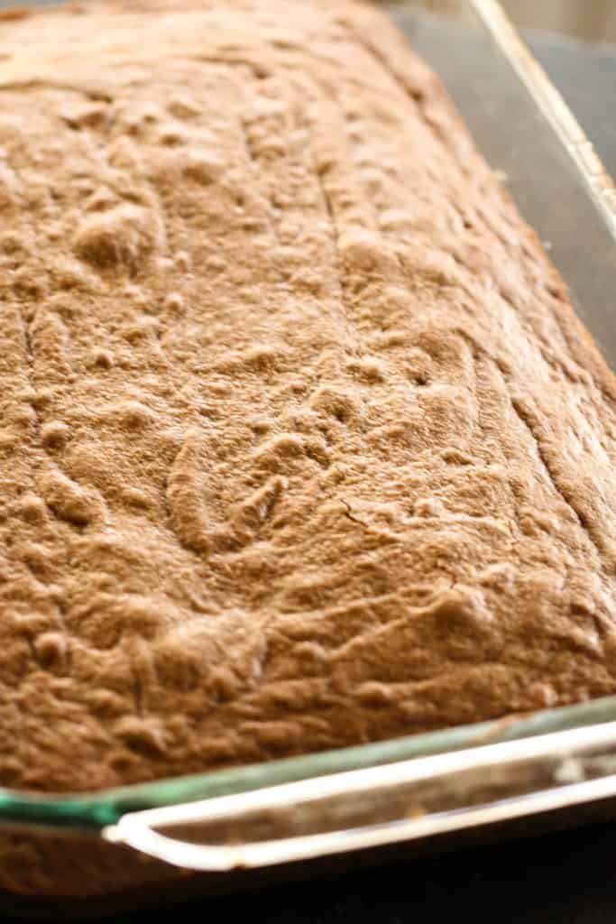 Fudgy Brownies baked in a glass baking dish.