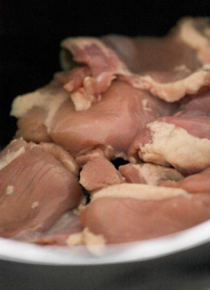 Chicken Thighs layered in the slow cooker