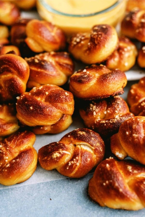 twisted soft pretzel bites on a baking sheet