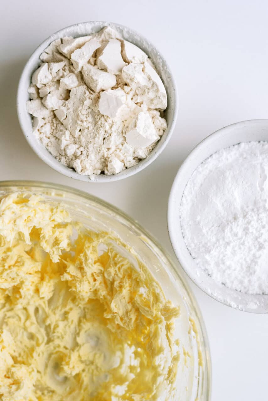 Flour and powdered sugar ready to be added to the butter mixture