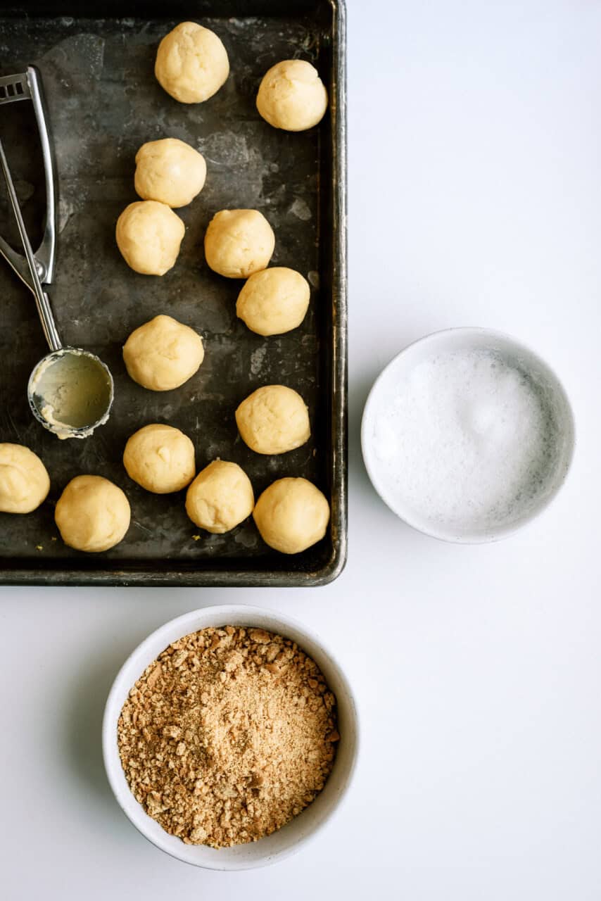 Dough rolled into balls and ready to dip in egg white and graham cracker