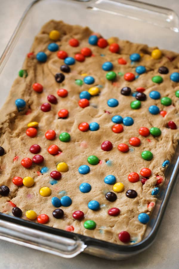 Thick and Chewy M&M Blondies batter in 9x13 dish