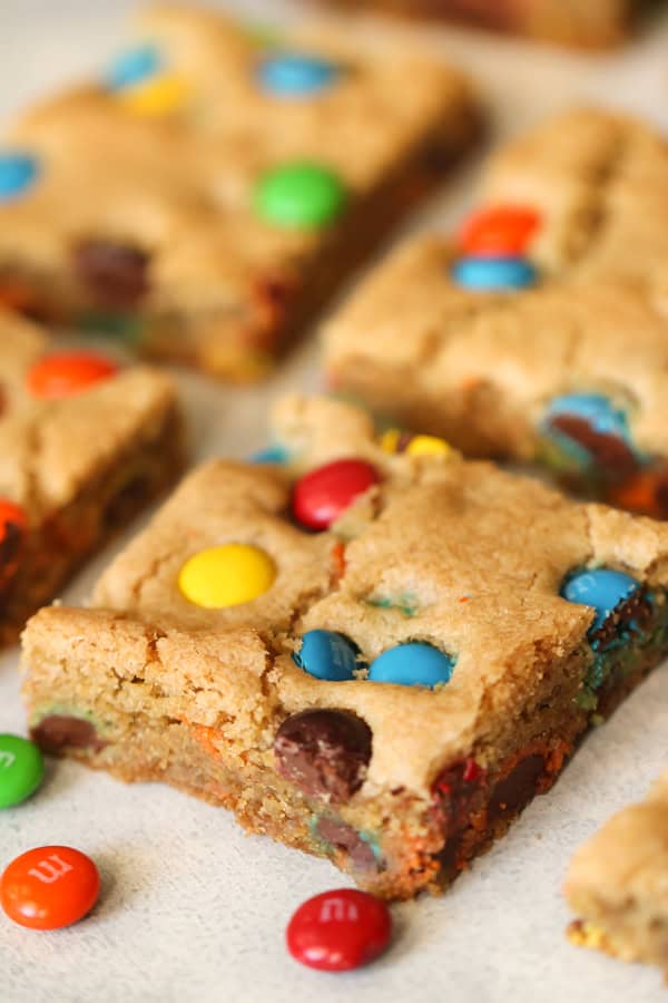 Thick and Chewy M&M Blondies cut into squares