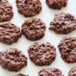 Nutella No Bake Cookies lined up in rows on wax paper.