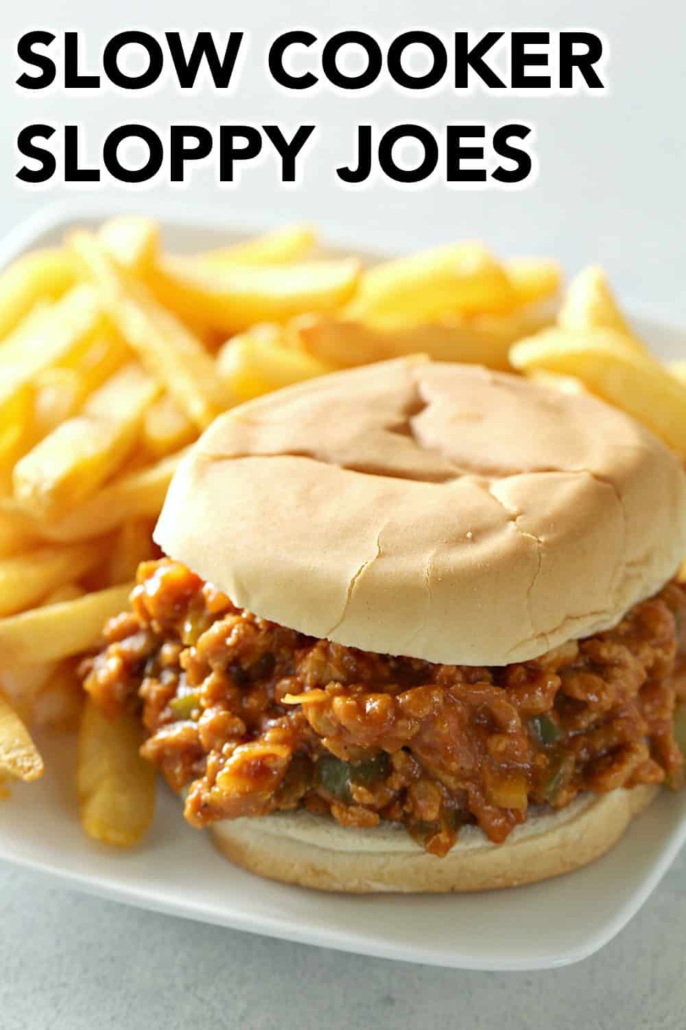 Slow Cooker Ground Turkey Sloppy Joes on a plate with fries