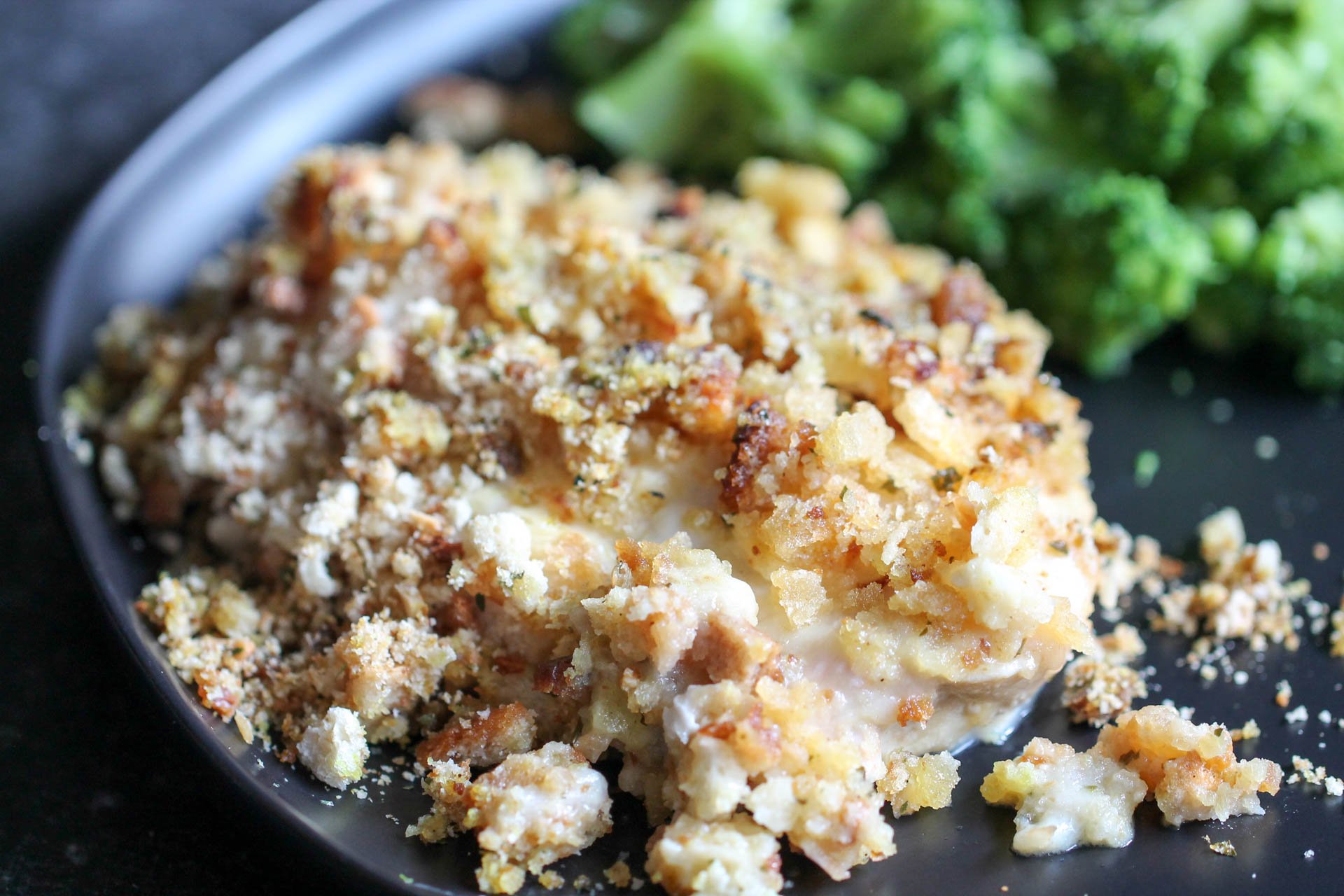 Slow Cooker Swiss Chicken on a plate with broccoli