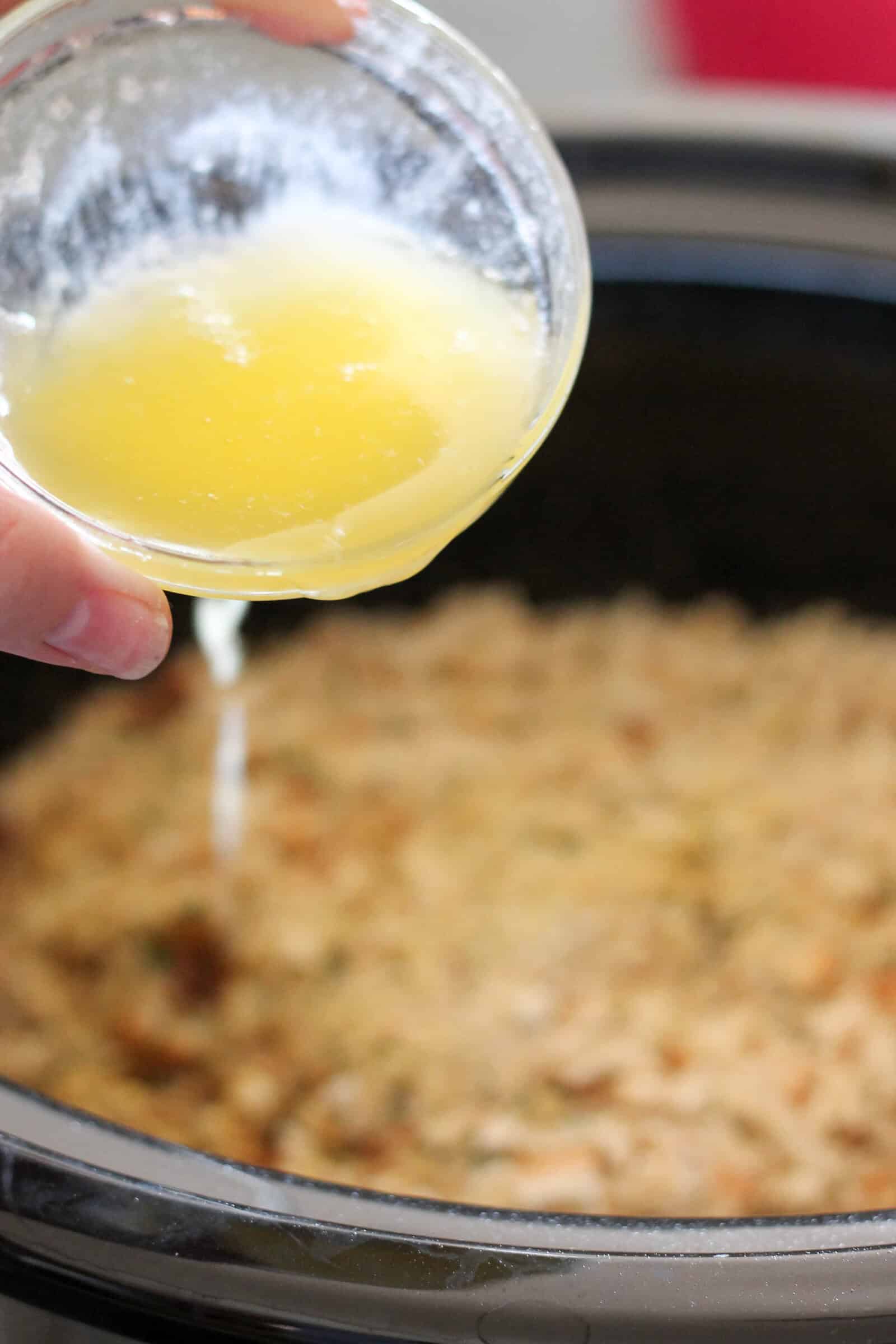 drizzling melted butter on top of everything in the slow cooker