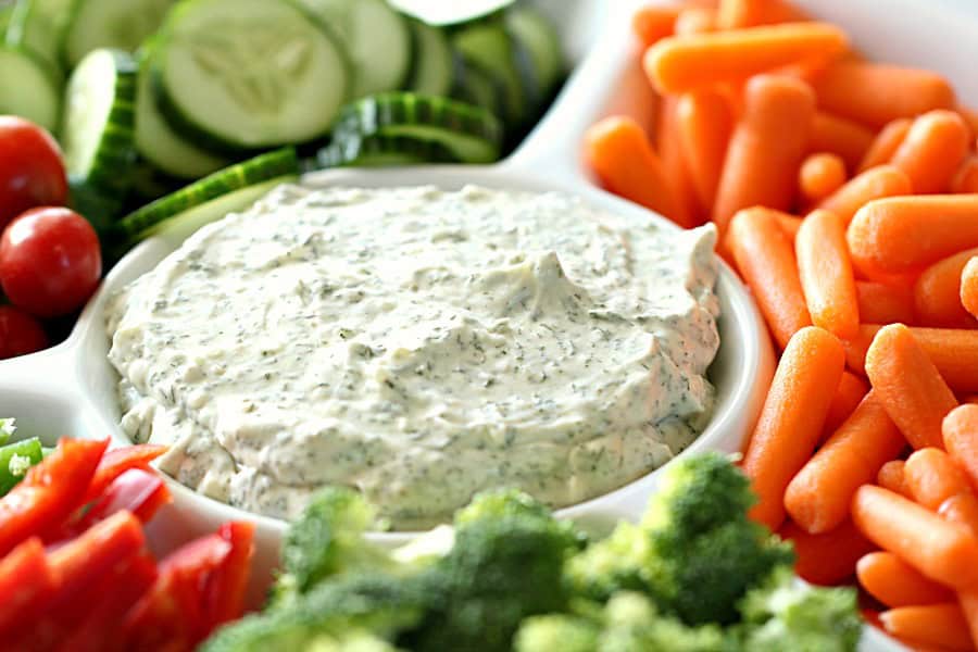 Vegetable Dill Dip on a platter with veggies