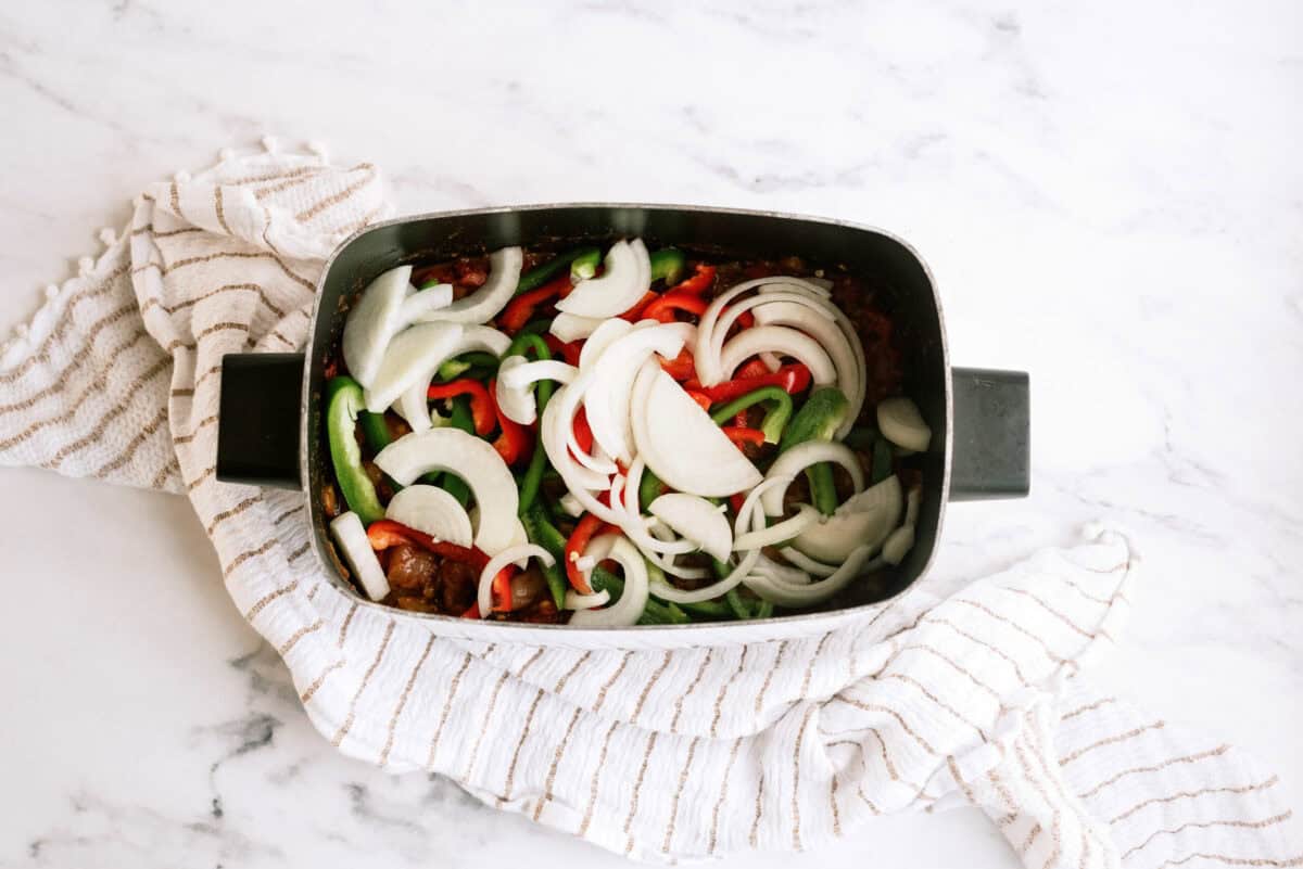 Sliced Peppers and Onions Slow Cooker for Fajitas