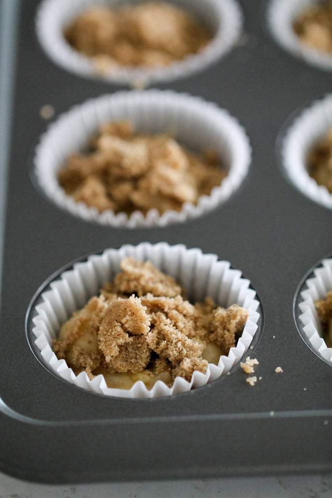 Banana Muffin Mixture with Crumb topping in muffin cup tin