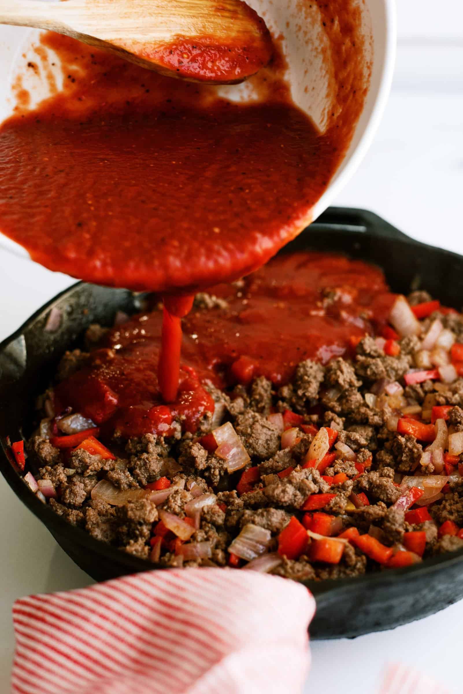 Sauce added to skillet with meat mixture