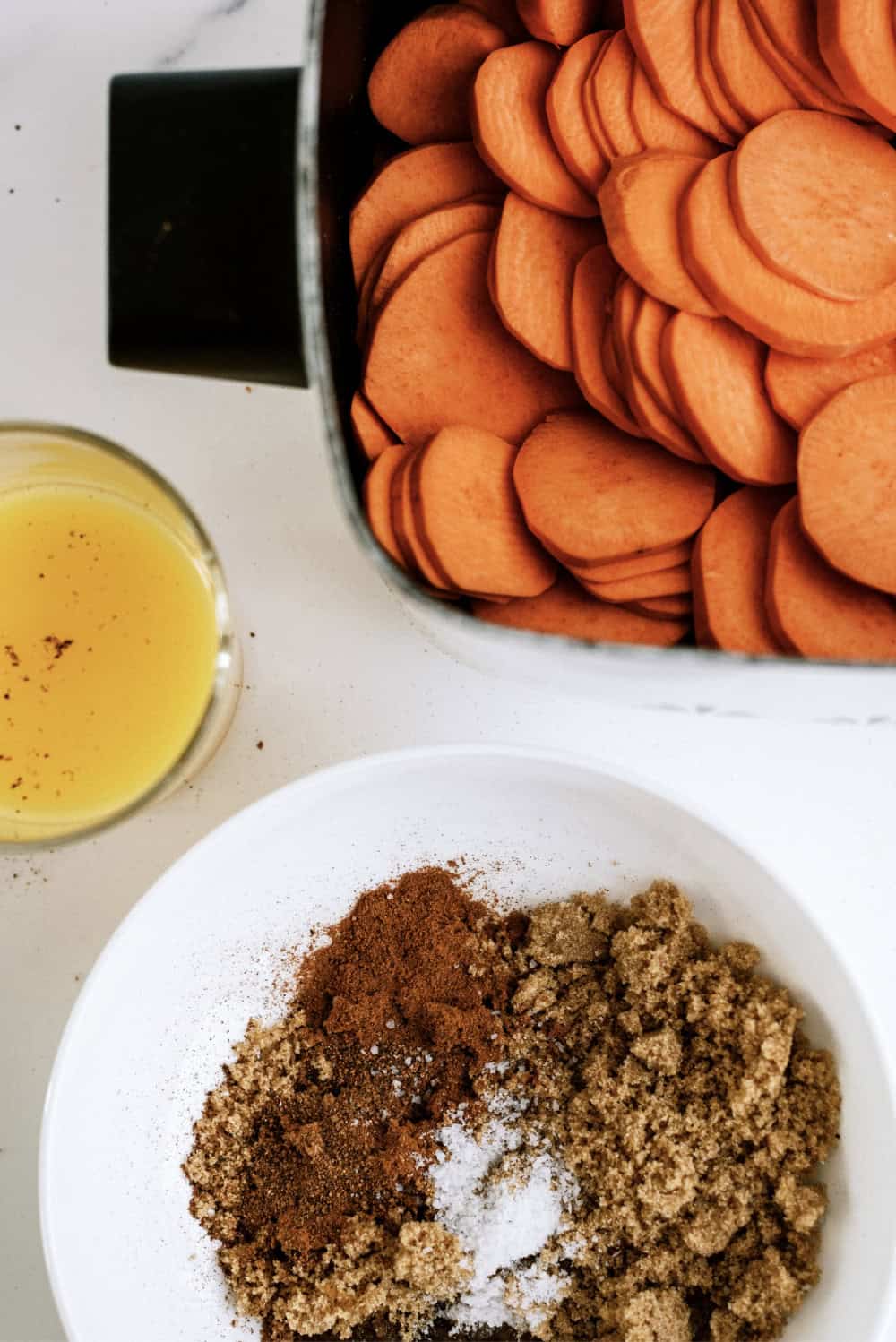 sliced sweet potatoes with brown sugar spices and orange juice
