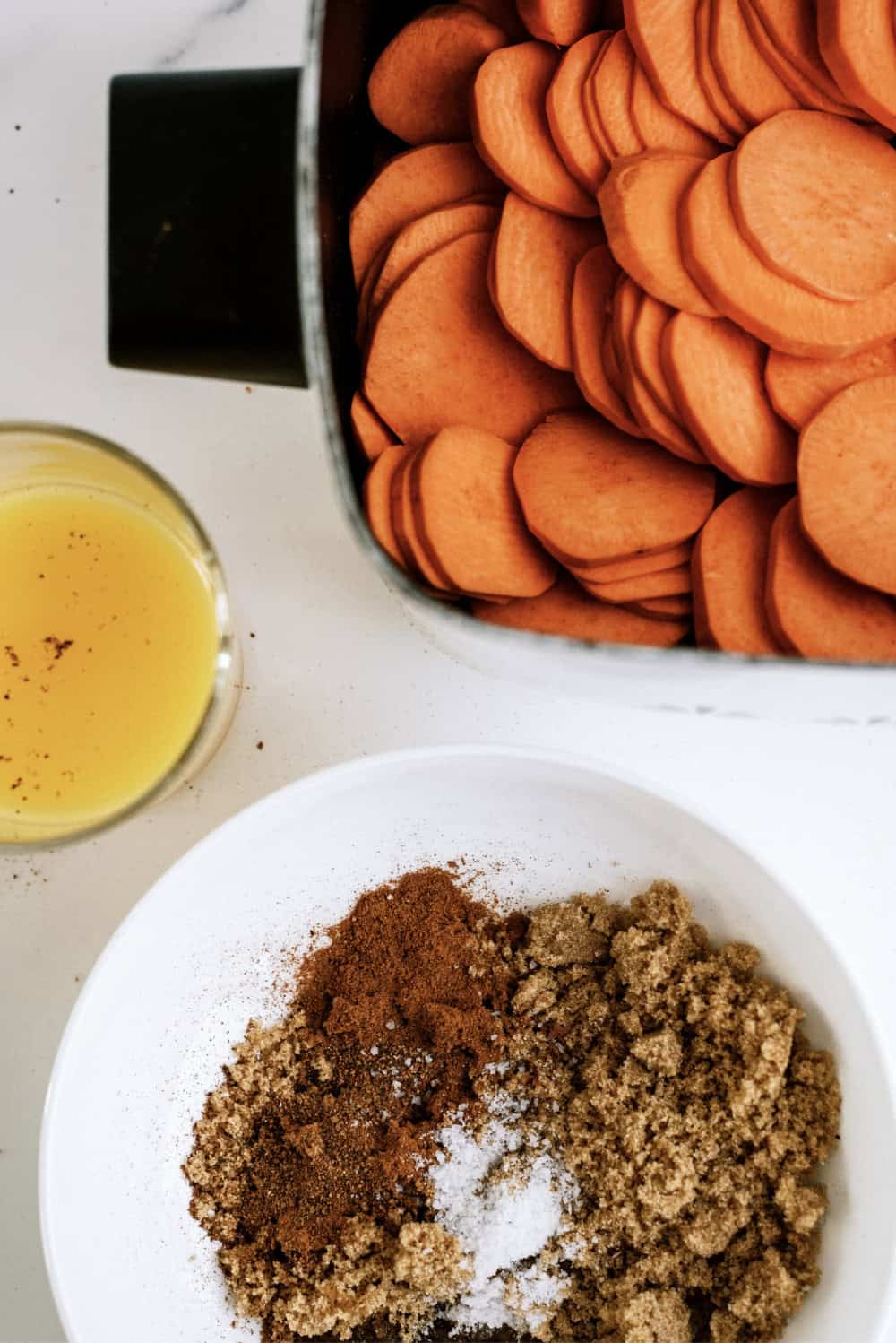 sliced sweet potatoes with brown sugar spices and orange juice