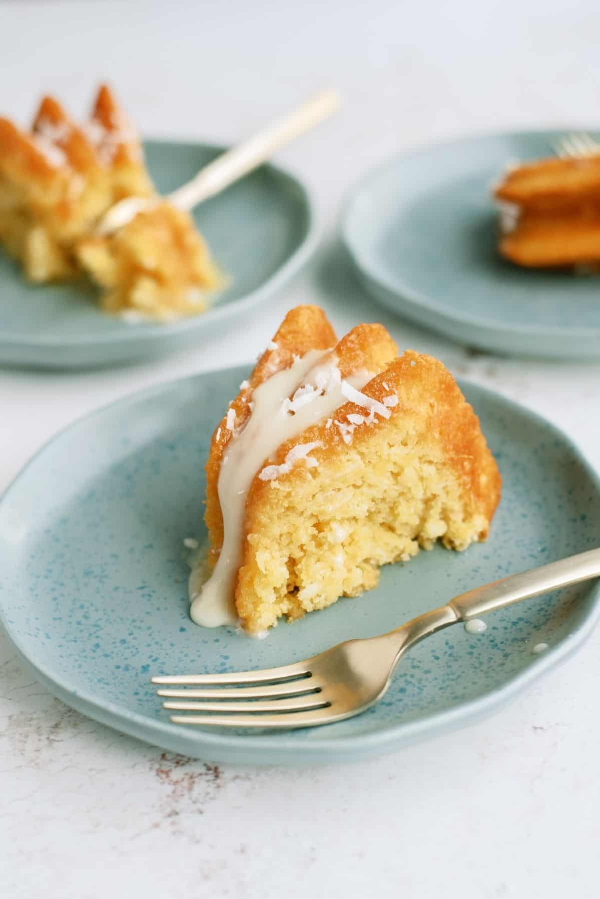 Slice of Pineapple Coconut Bundt Cake on a plate