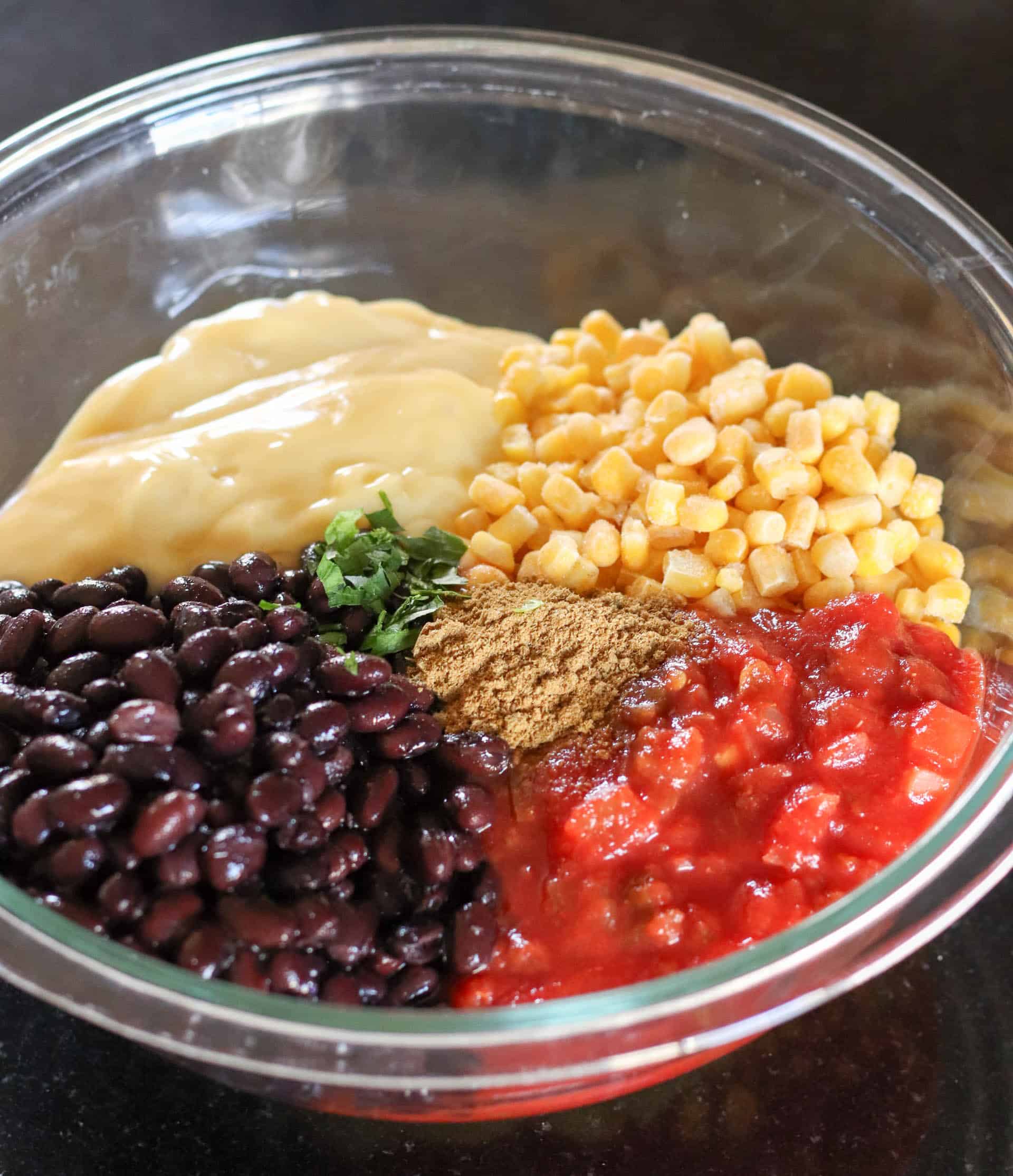 Veggies and soup mixture in mixing bowl