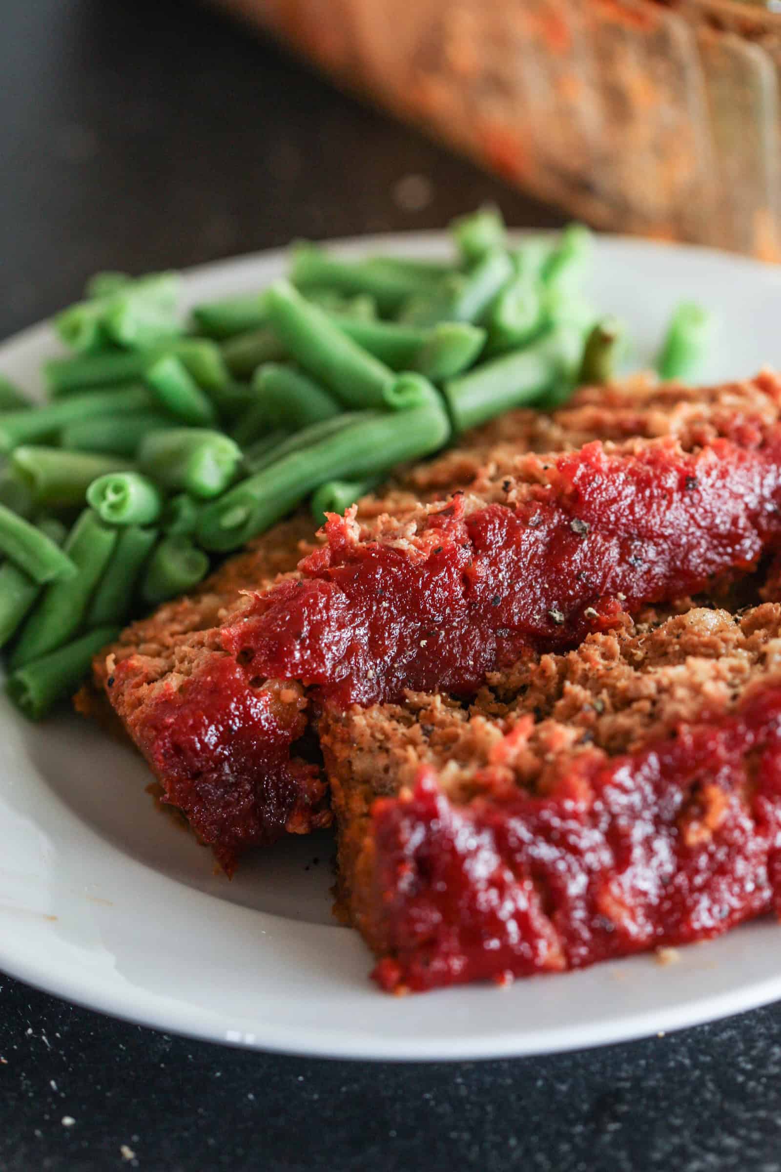 Easy Turkey Meatloaf with green beans on a plate