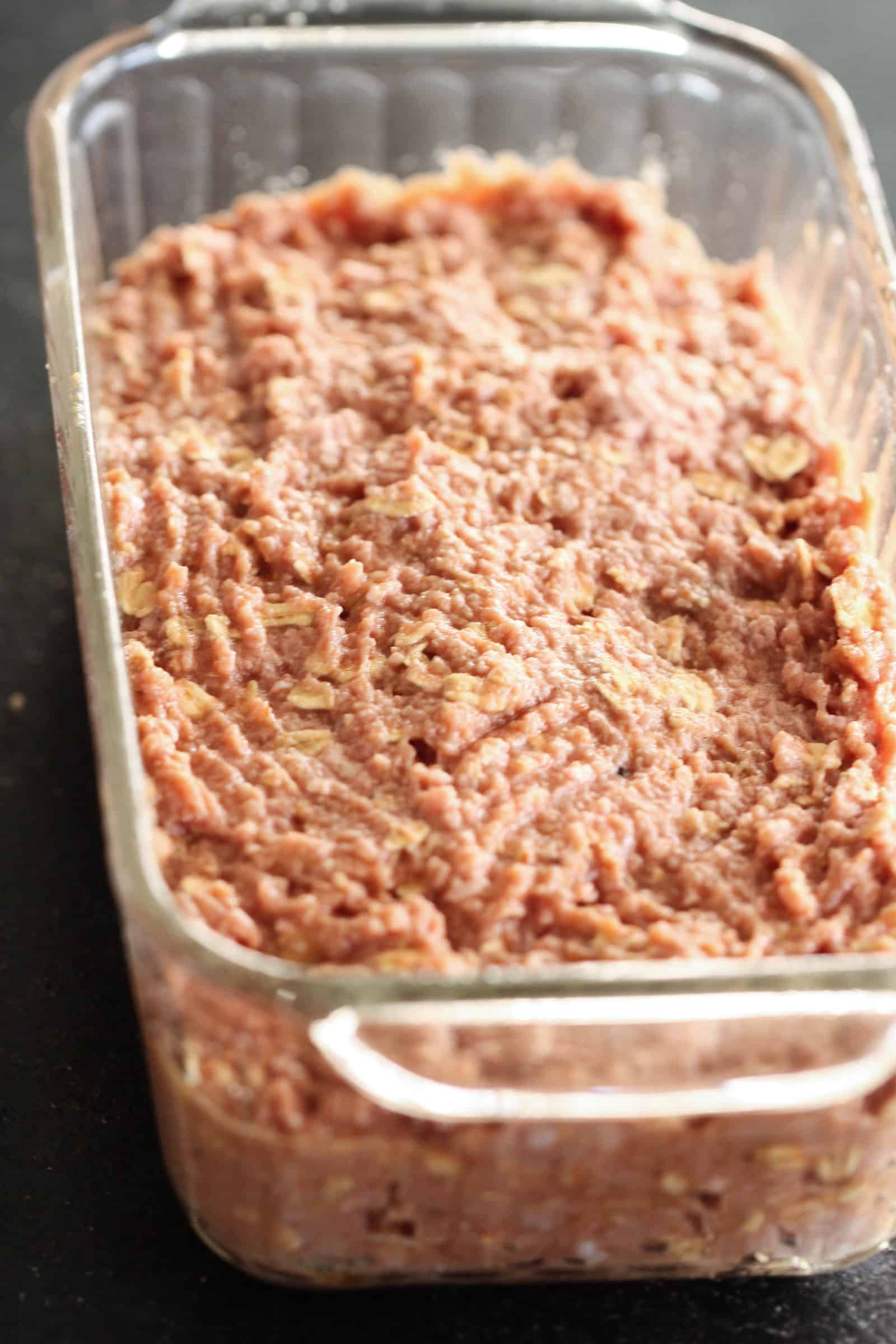 Press mixture into glass meatloaf pan