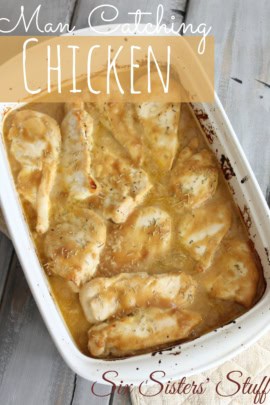 A baking dish containing cooked chicken fillets in a seasoned sauce