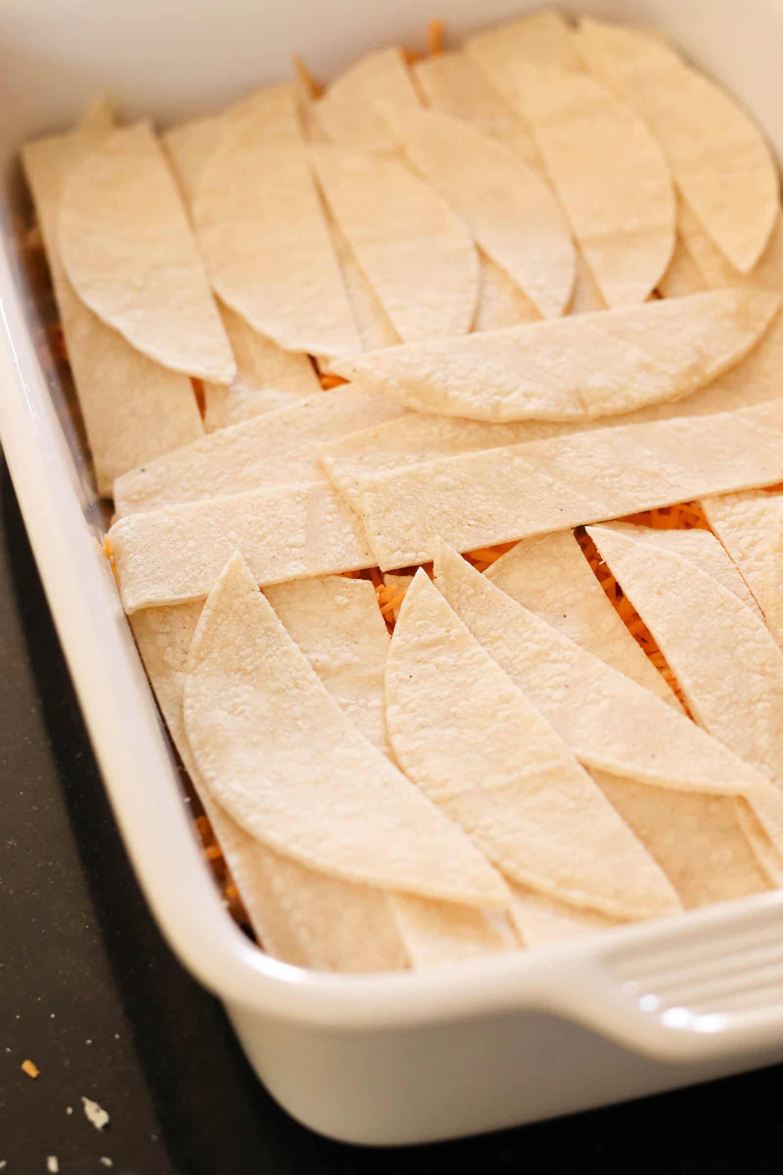 Tortilla Strips layer on top of the chicken mixture layer