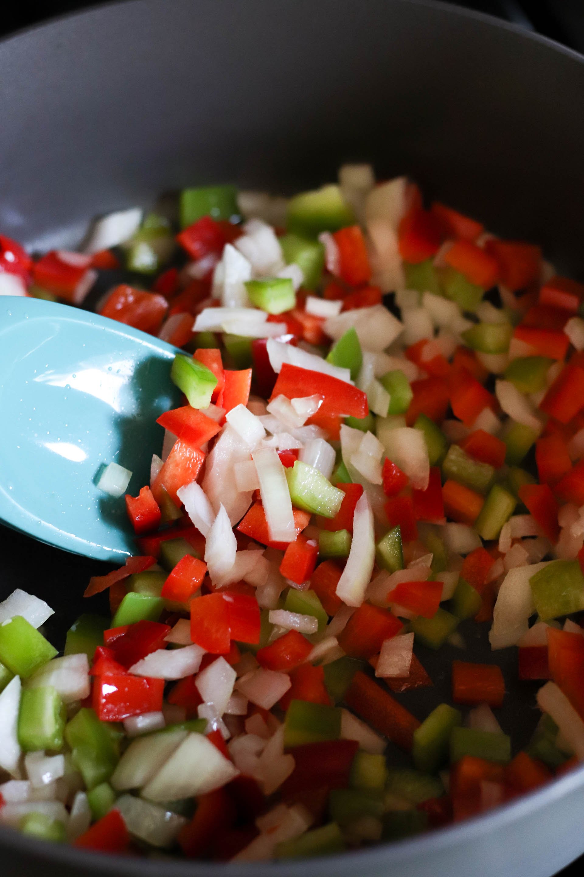 Chopped veggies in a large non stick skillet