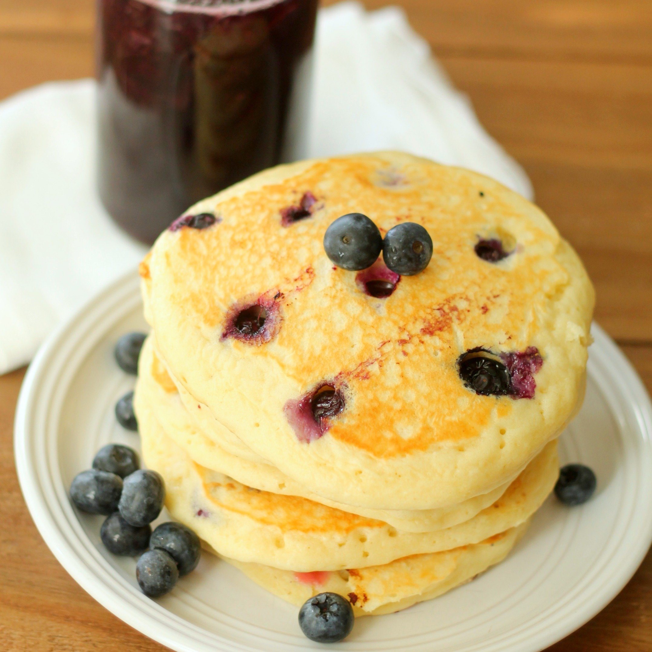 homemade blueberry pancakes with blueberry syrup