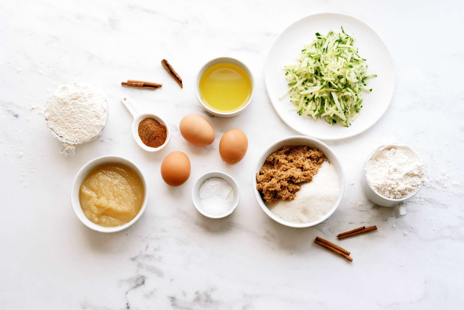 Ingredients needed to make Cinnamon Zucchini Cake with Cream Cheese Frosting.