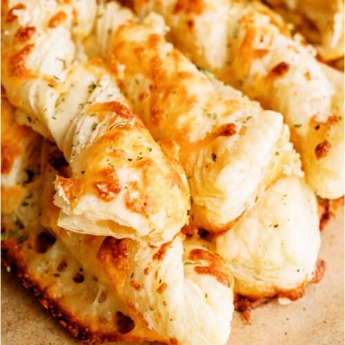 Twisted Cheese Breadsticks in a pile.